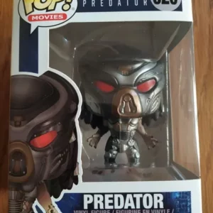 Figurine Funko Pop Predator 620 The Predator, représentant le célèbre chasseur extraterrestre avec ses yeux rouges emblématiques.